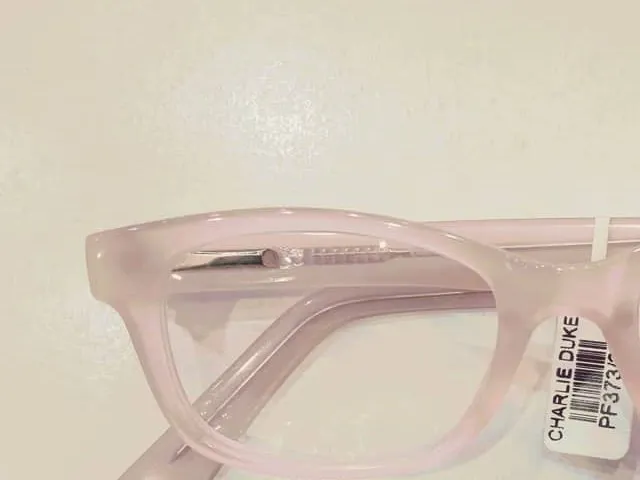 Close view of the soft pink kids frame and its tag